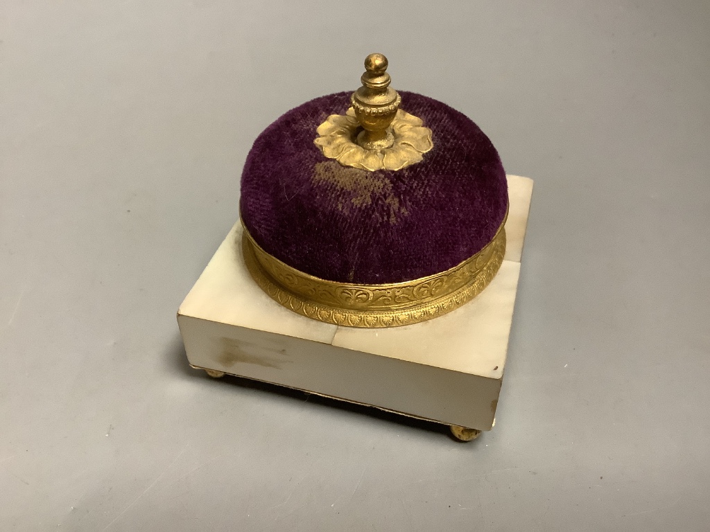 A 19th century French Palais Royale mother of pearl pin cushion